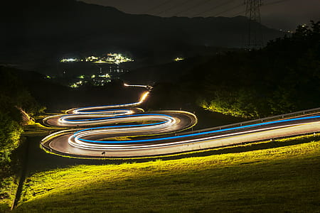 time lapse photo of car on highway during nighttime thumbnail