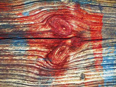 closeup photo of red, blue, and brown wooded board thumbnail
