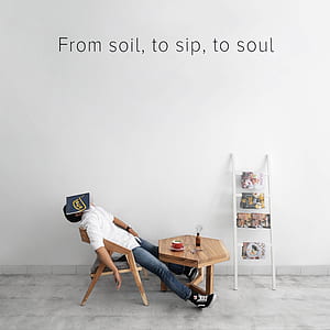 man sleeping on brown wooden chair with text overlay thumbnail