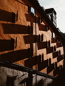 brown and gray concrete building thumbnail