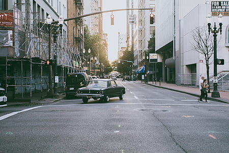 car on street with traffic light on red thumbnail