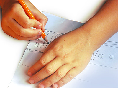 person drawing on paper thumbnail