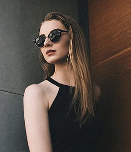 woman wearing black halter top thumbnail