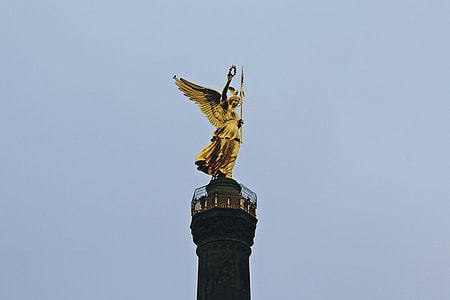 brass statue at daytime thumbnail
