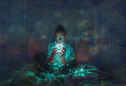 person holding string lights thumbnail