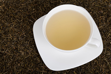 white ceramic mug on white square saucer thumbnail
