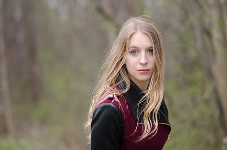 closeup photo of woman in black red top thumbnail