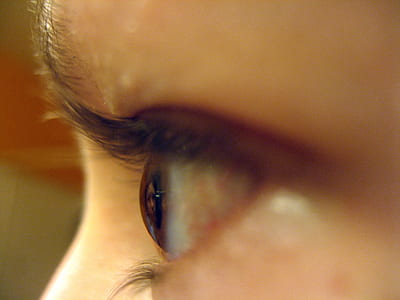 selective macro photography of left human eye thumbnail