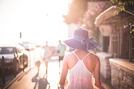 Beautiful Girl with Hat in Sun thumbnail