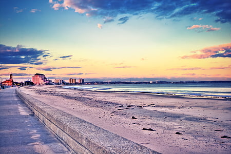 body of water under cloudy sky thumbnail