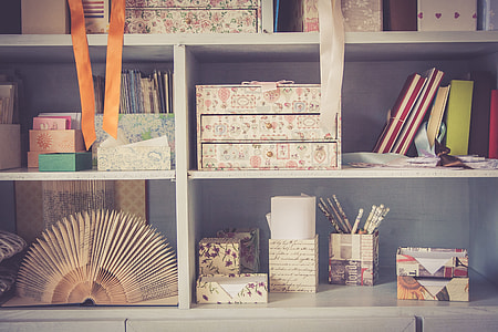 shelf with boxes and fans thumbnail
