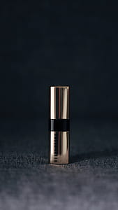 shallow focus photography of perfume bottle thumbnail