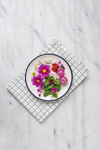 assorted flowers on plate thumbnail