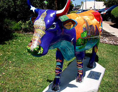 multicolored cattle statue during day thumbnail