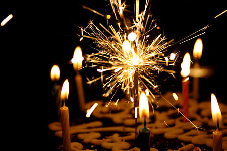 lighted candles and sparkling candle thumbnail