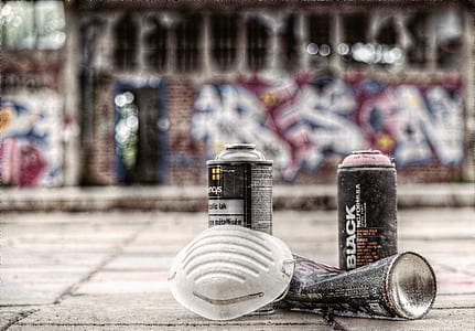 two black spray cans thumbnail