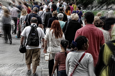 shallow focus photography of people walking thumbnail