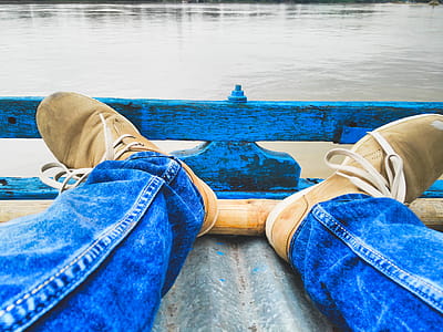 Person Sitting Near Body of Water thumbnail