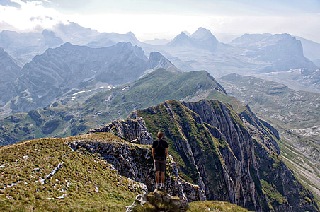 person standing on top of mountain thumbnail