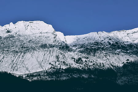 gray mountain under blue sky thumbnail