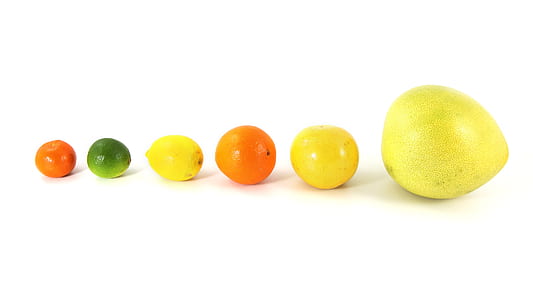 six assorted-color fruits on white surface thumbnail