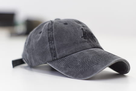 closeup photo of gray curve-brimmed cap thumbnail