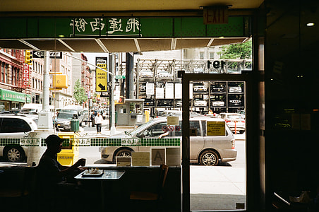 man sitting beside table thumbnail