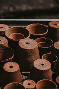 tilt shift photo of clay pots thumbnail