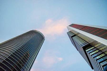 angle view of high-rise buildings under blue sky thumbnail