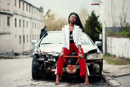 Woman Sitting in Front of the Car thumbnail