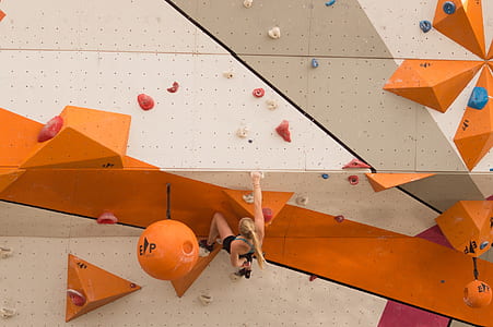 woman performing wall climbing sport thumbnail