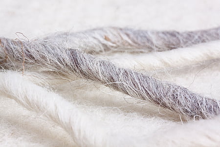 closeup photo of white and brown cloth thumbnail