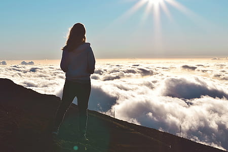 Woman Standing on Mountain thumbnail