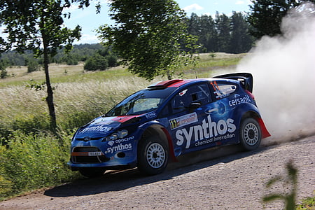 black Ford Focus 5-door hatchback drifting at rally track thumbnail