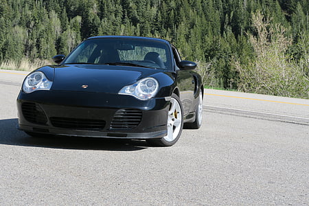 black Porsche coupe thumbnail