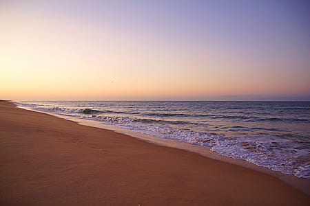 open sea near seashore at daytime thumbnail