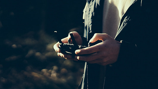 person holding controller thumbnail