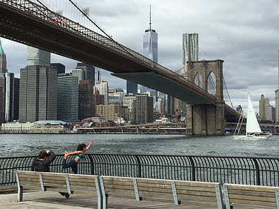 woman doing yoga near Brooklyn Bridge thumbnail