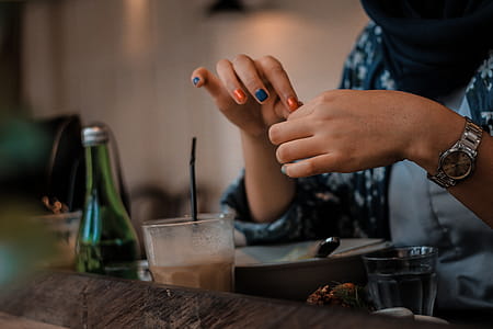 Woman Beside Drinking Glass and Bottle thumbnail