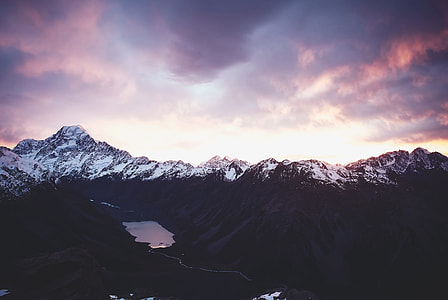 snow-capped mountain under blue cloudy sky thumbnail