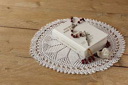 red rosary on bible thumbnail