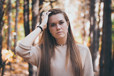 selective focus photography of woman taking selfie thumbnail