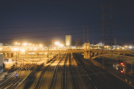lighted gray concrete bridge and road thumbnail