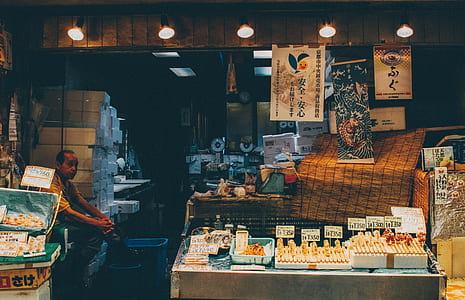 man sitting near supplies thumbnail