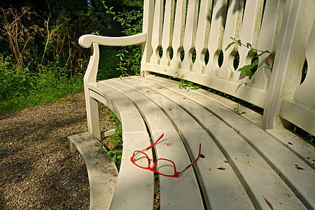 eyeglasses on white wooden bench thumbnail