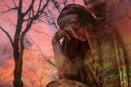 statue of woman during sunset thumbnail