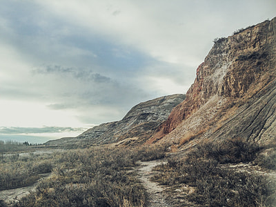 rocky mountain under gray clouds thumbnail
