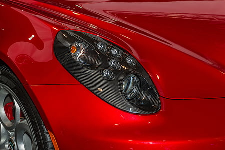 close-up photo of gray car headlight thumbnail