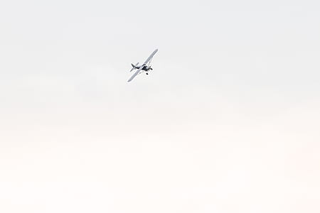 white airplane on the sky during daytime thumbnail