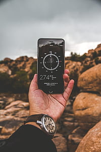 person using space gray iPhone 6 thumbnail